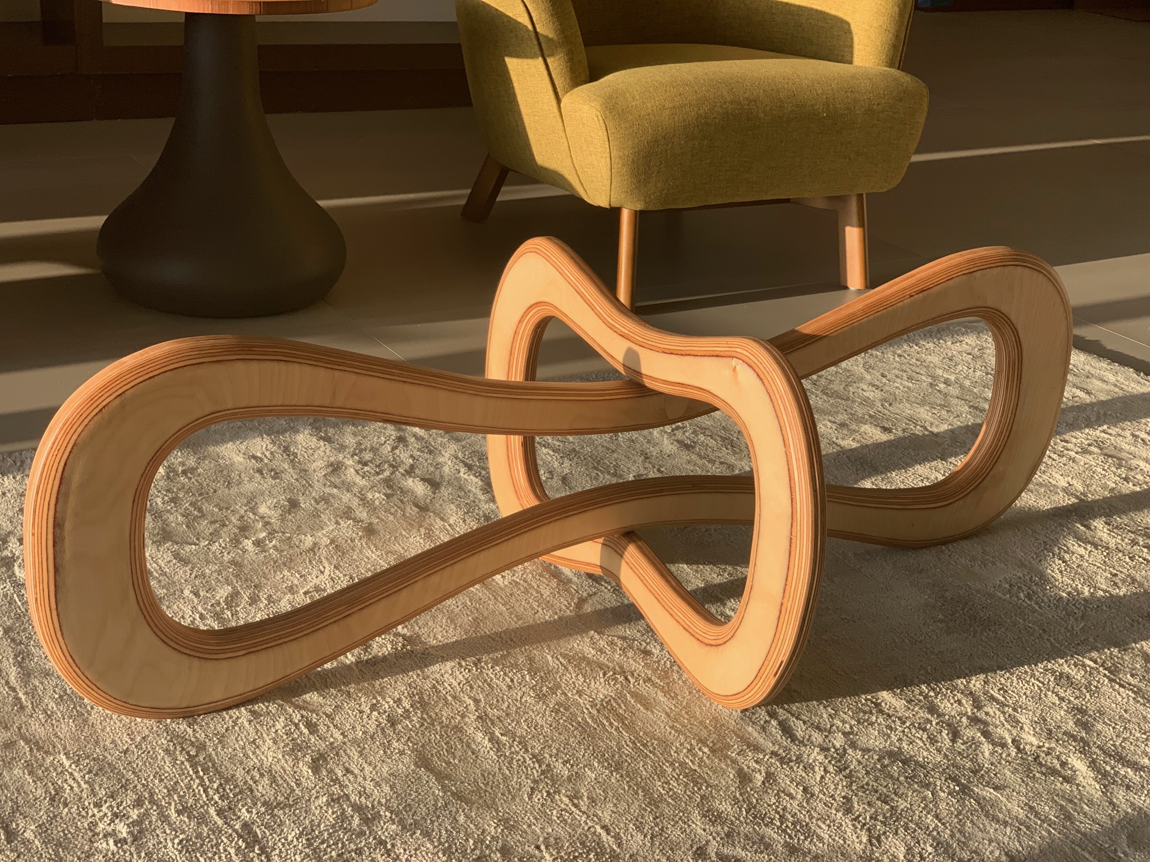 Sculptural coffee table base by Greg Schneider