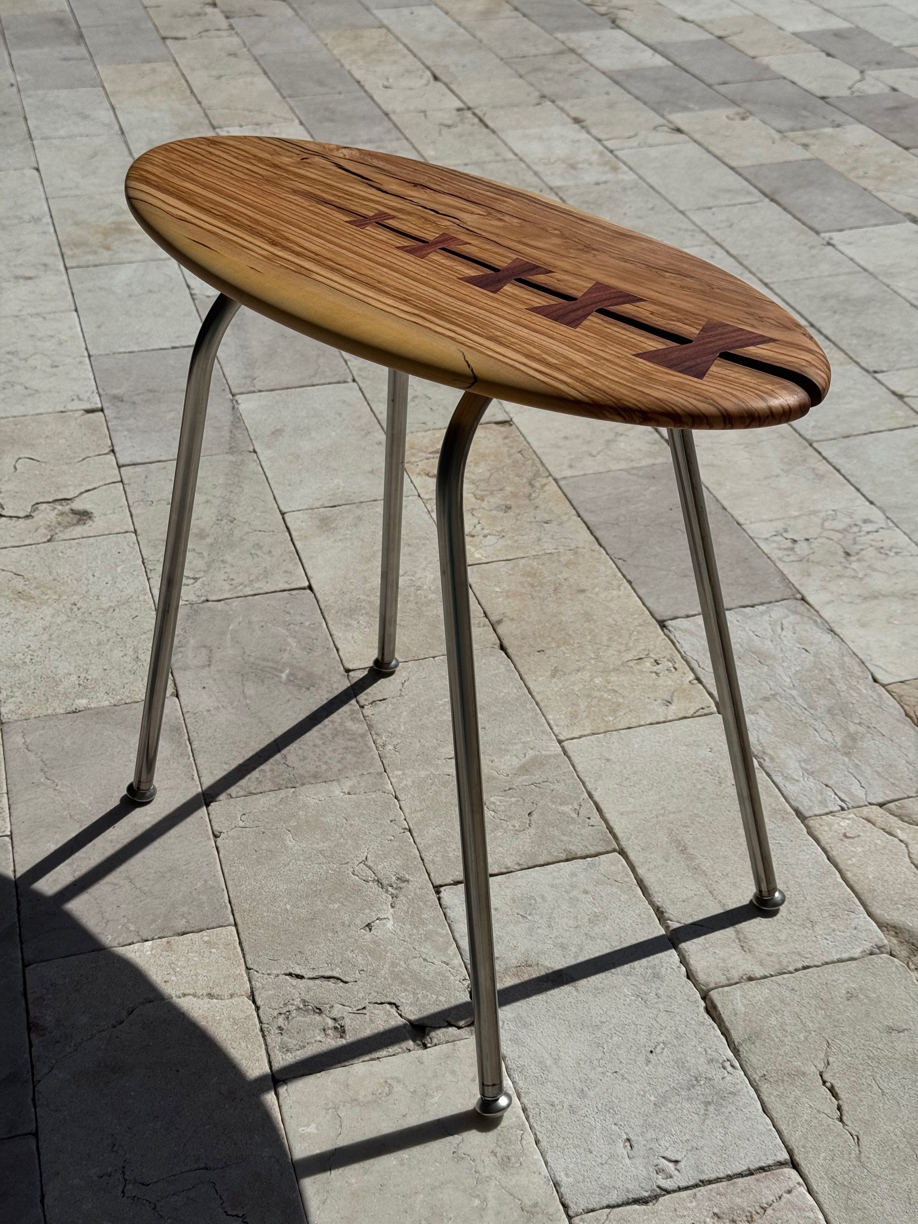 Zebrawood oval side table with walnut inlay and steel legs